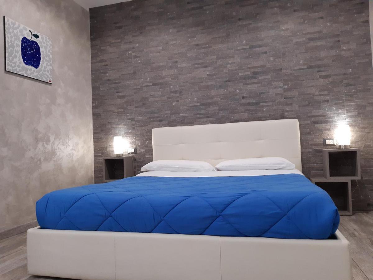 Apple Rooms Rome Airport Ф'юмічіно Екстер'єр фото A bed